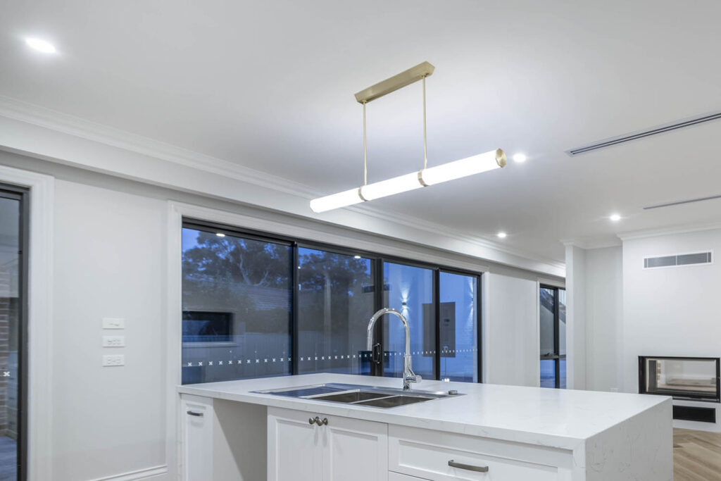 Ebden Street Ainslie residence kitchen bench and fireplace