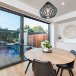 Haig Development, Turner view from dining area to rear deck and pool